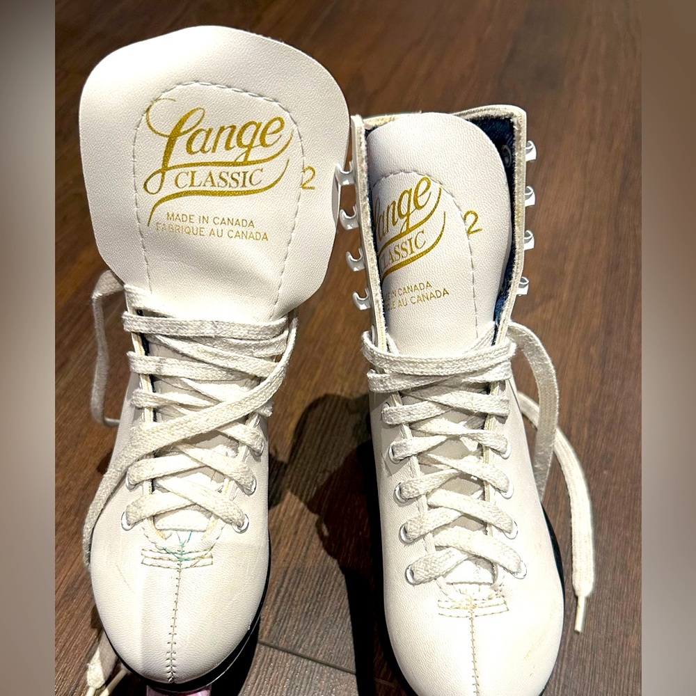 Girls white figure skates